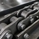 Cadena transportadora industrial lubricada con grafito seco